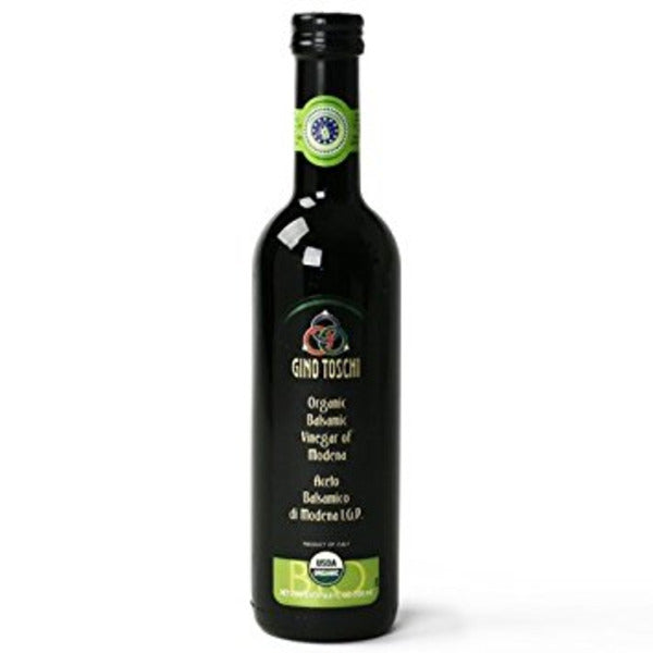 Bottle of Gino Toschi organic balsamic vinegar on a white background