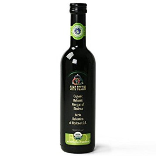 Bottle of Gino Toschi organic balsamic vinegar on a white background